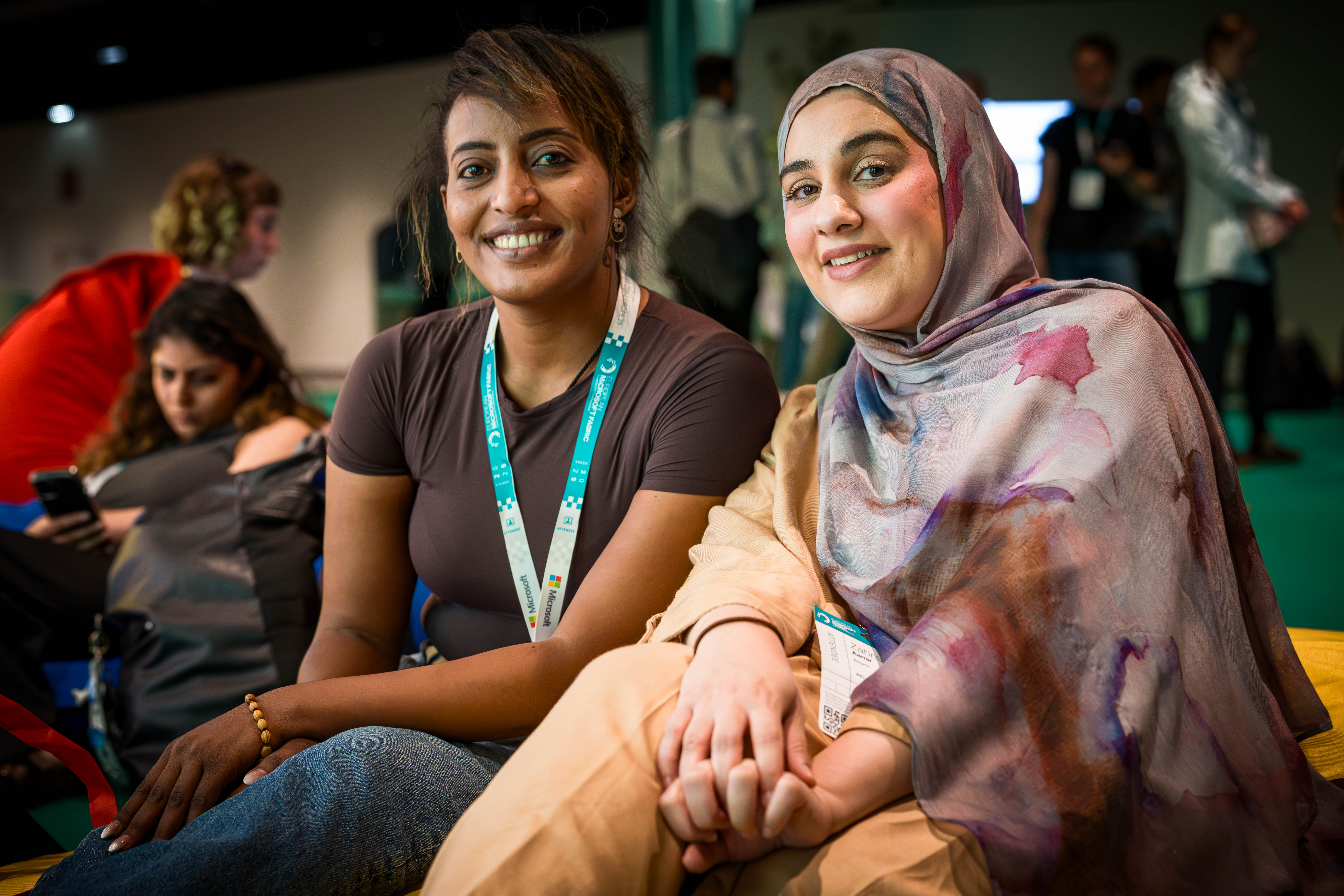 2 smiling women