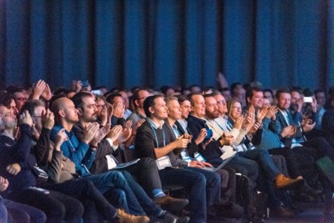 Full audience paying attention to session/keynote