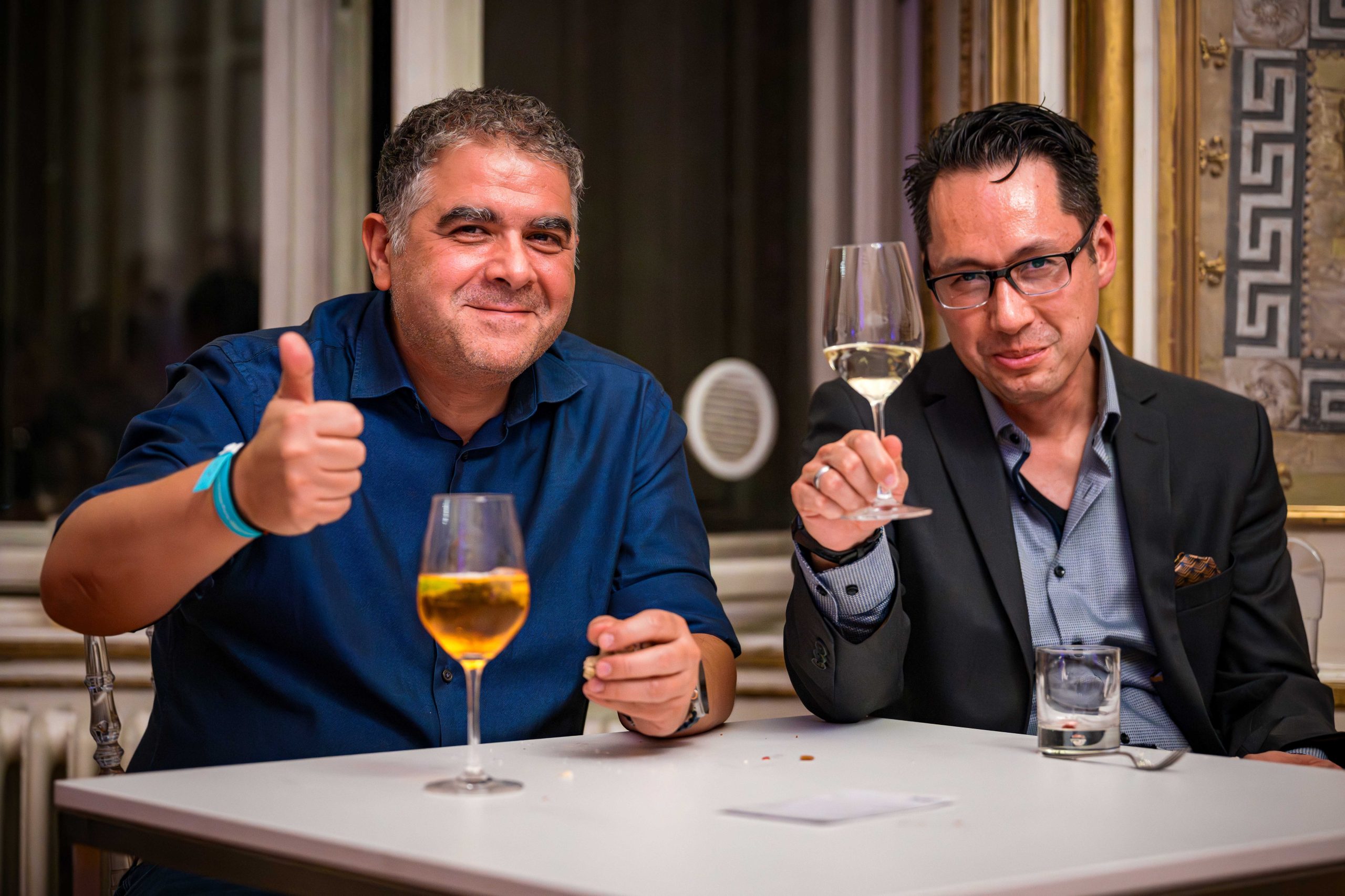 2 men enjoying th party and cheers drinks