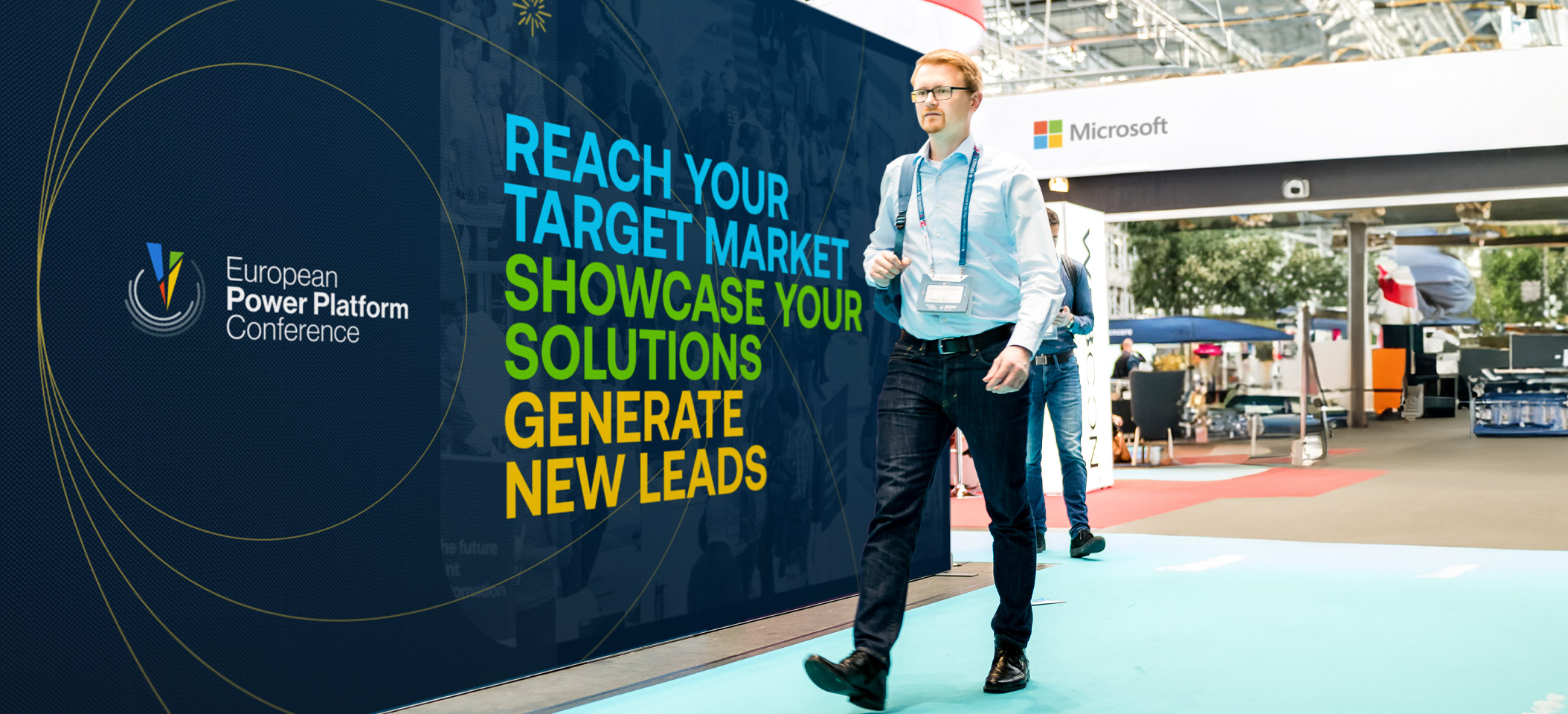 EPPC Attendee walking past a booth in the Expo Hall