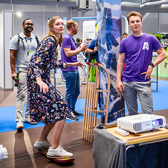 EPPC Attendee on an interactive game in the EXPO Hall