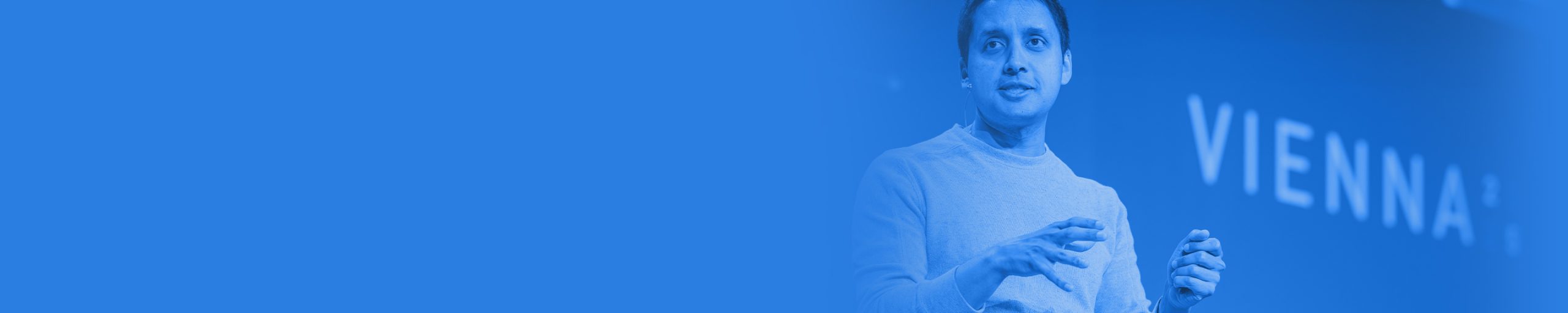 speaker addresses the audience during a keynote